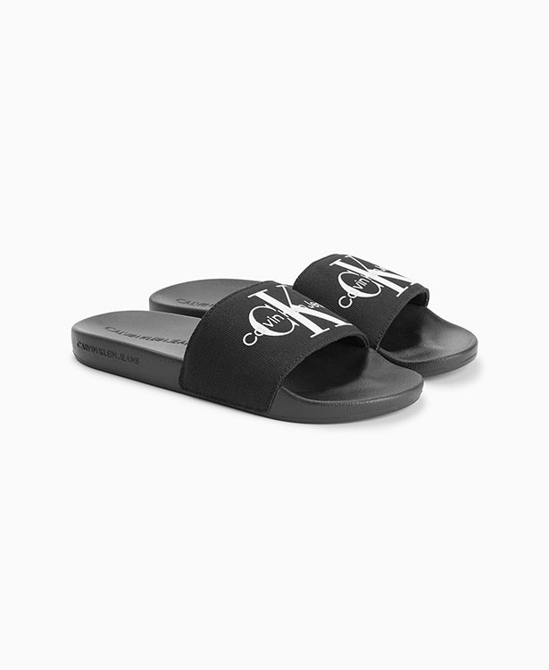 <p style="text-align: left;"><a href="/monogram-logo-slides-black-yw0yw00103bds" style="color: #000000;">Monogram Logo Slides</a></span>